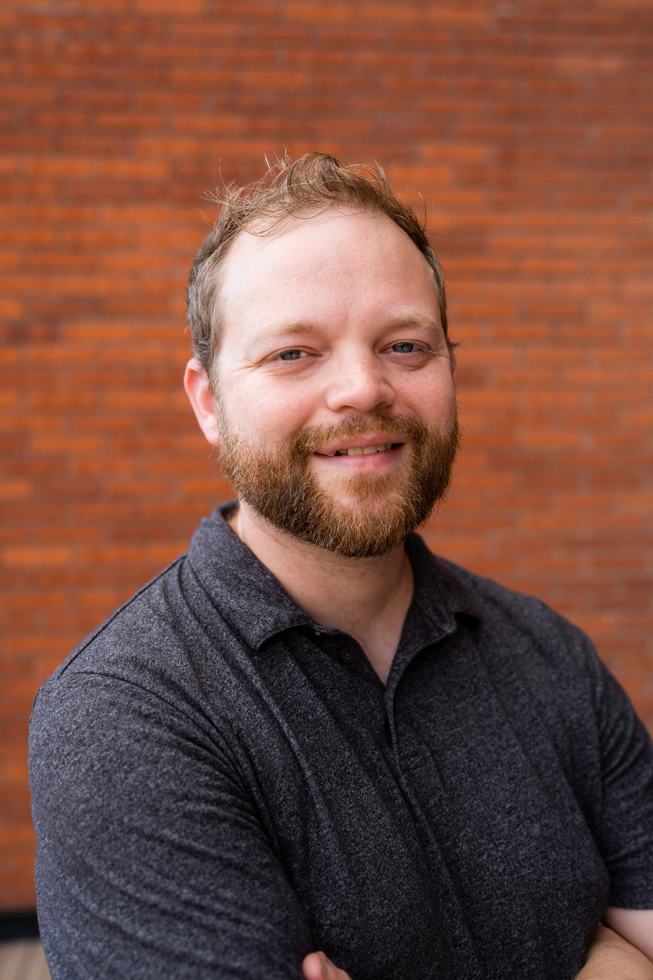 Portrait of Brennan Doud, fractional CMO and marketing consultant